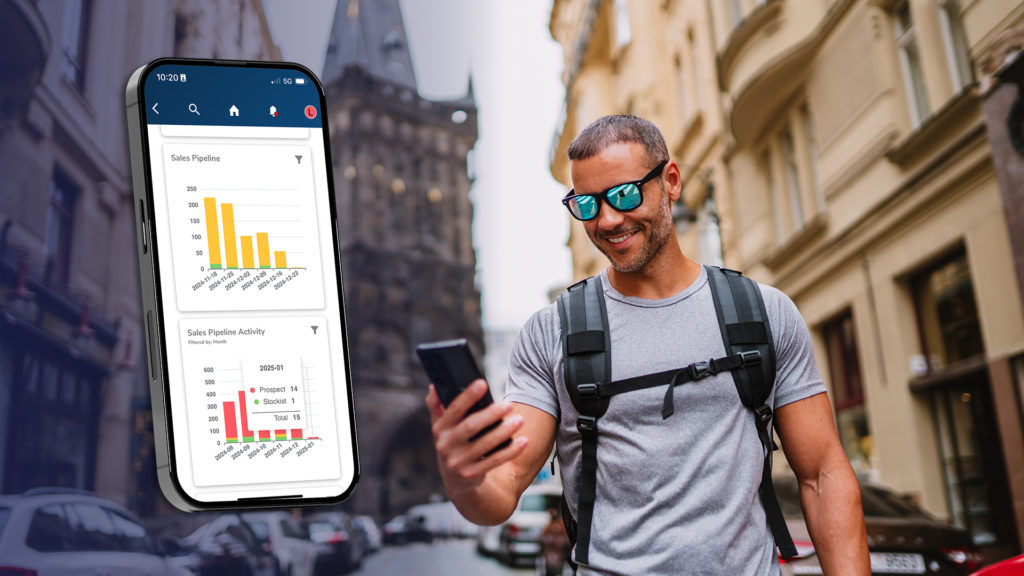 man looking at Bowimi insight dashboards on his phone while walking down a street