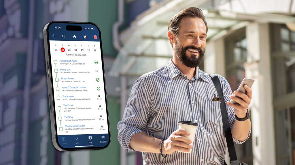Field rep walking down road checking his route plan in the Bowimi app