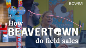 An arrow pointing from a Beavertown tap to a Bowimi account manager and Beavertown field sales manager looking at insights on a laptop