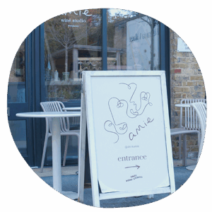 entrance sign outside of amie wine studio